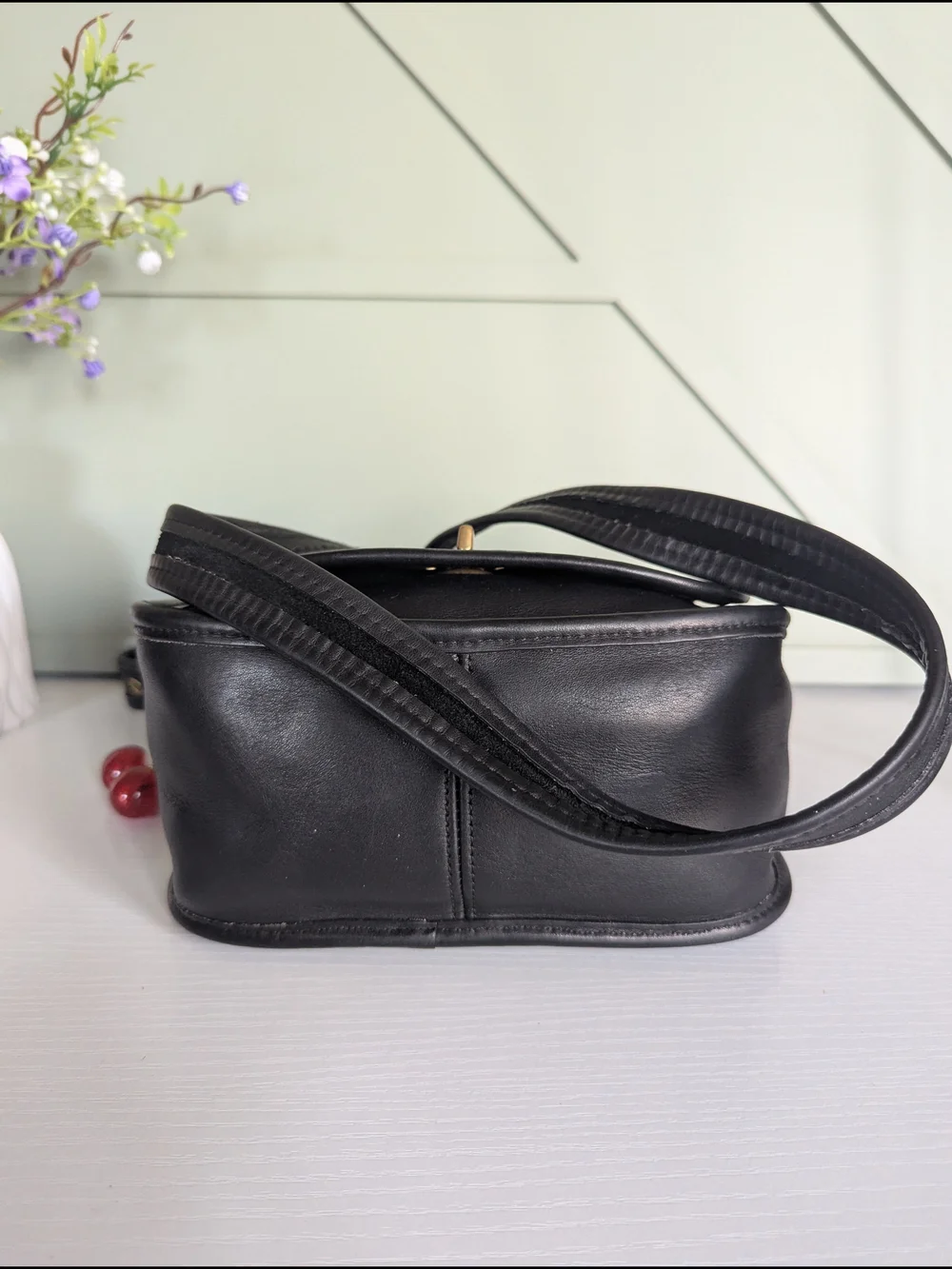 Coach Black Leather Crossbody with Gold Hardware and Cherry Charm
